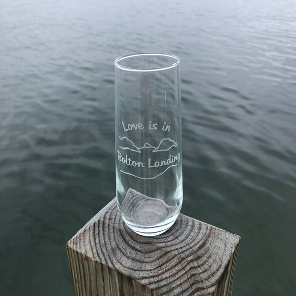 Stemless wine flute with our lake and mountain graphic. Love is in Bolton Landing is the text.