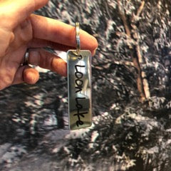 Loon Lake Text laser etched on a stainless key tag.
