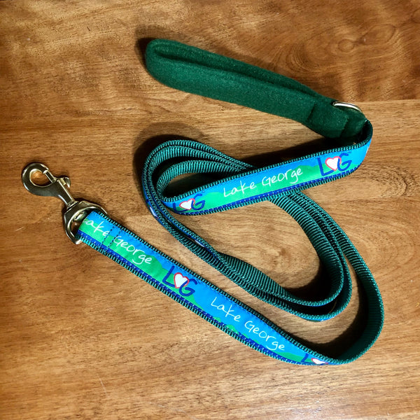Dog leash with interlocking LheartG logo in between Lake George on a ribbon with nylon webbing on the other side of the dog leash
