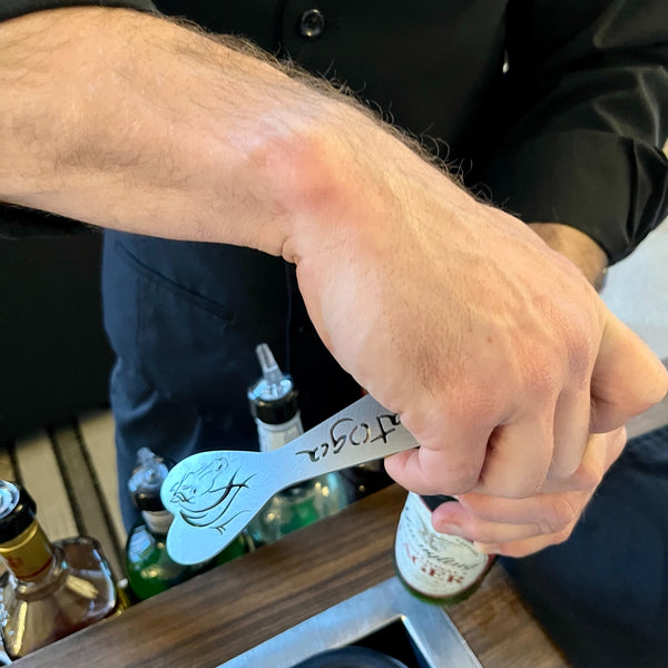 Stainless Horse in a heart bottle opener with Saratoga spelled out.