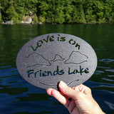 Love is on Friends Lake text with the outline of the lake and surrounding Adirondack mountainscape.