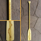 5' wooden oar with the Silhouette of the Chain of Lakes laser etched on the blade; the ADIRONDACKS Lasered on the oar handle.