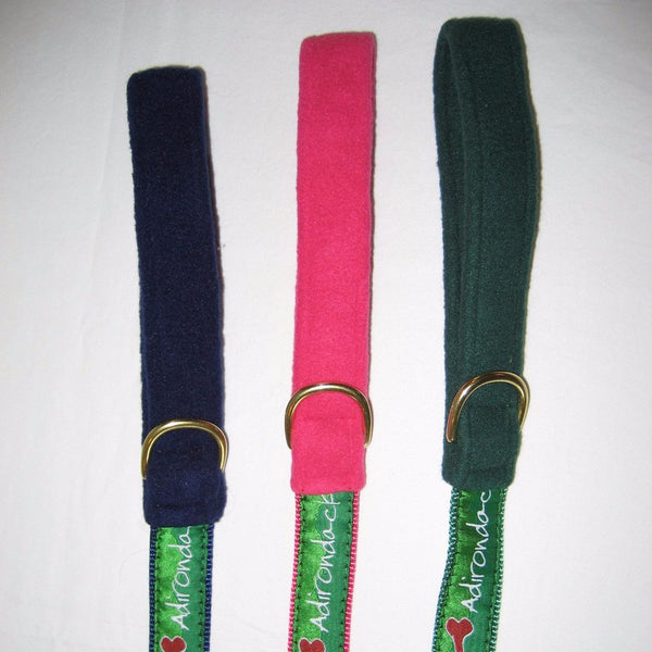 Adirondack Dog leash with our ADK in a heart logo, a dog bone, paw and the Adirondacks on a ribbon with webbing on the other side of the dog leash; comfort fleece handle; navy, pink and green.