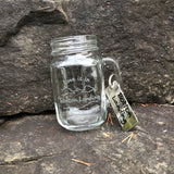 Glass handled mason jar with our lake and mountain graphic.  Love is in Bolton Landing is the text.Paired with a Stainless Bolton Landing Key Chain.  The opposite side of the Bolton Landing Keychain has a star on the silhouette of Lake George noting the location of Bolton Landing.