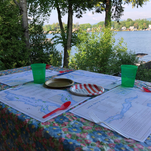 Laminated map of the Islands of Lake George Disposable placemats including some fun facts. One-sided; white background, blue lake and green islands.