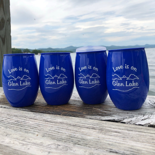 Love is on Glen Lake Text in white on a blue plastic cup with the lake and mountain scene.  Set of 4.