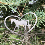 Heart Ornament with a Horse inside the heart  hung with a  hand tied twine hanger. Made of stainless steel.