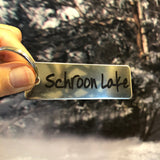 Schroon Lake text on a stainless key tag with ring; key chain.
