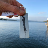 Silhouette of Brant Lake on a stainless steel key chain.
