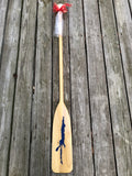 The Silhouette of Indian Lake etched on the blade of a 5' paddle and painted blue.