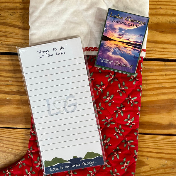Note pad paired with a deck of Lake George photo playing cards.