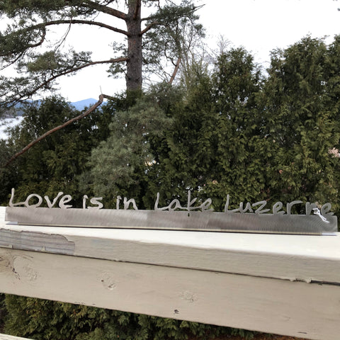 Lake Luzerne metal sign