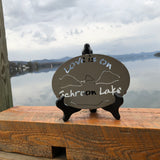 Love is on Schroon Lake text with the outline of the lake and surrounding Adirondack mountainscape