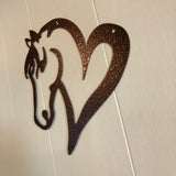 Metal Horse head attached to a heart wall mount; copper pebble finish